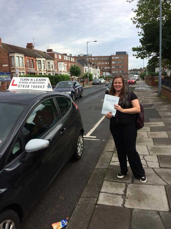 Wow! A very happy lady - now legally allowed to drive on the road.